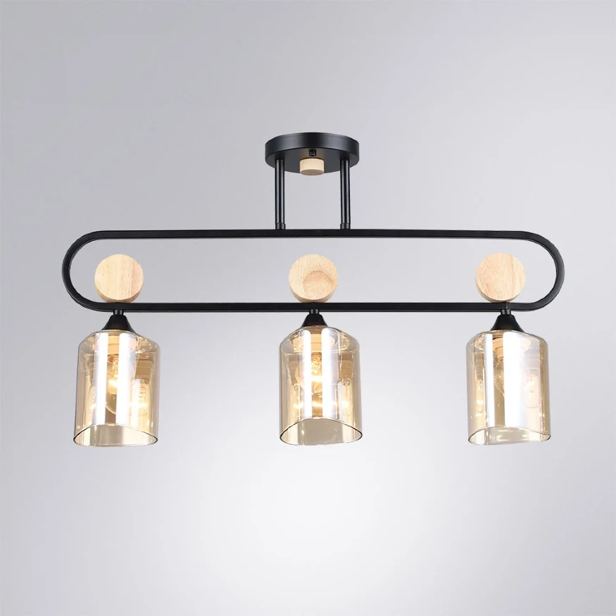 Arte Lamp Glamore A5076PL-3BK Потолочный современный вытянутый светильник длиной 62 см, черный металл, плафоны 3шт, янтарное стекло, лампы E27 3шт до 60Вт IP20 220В